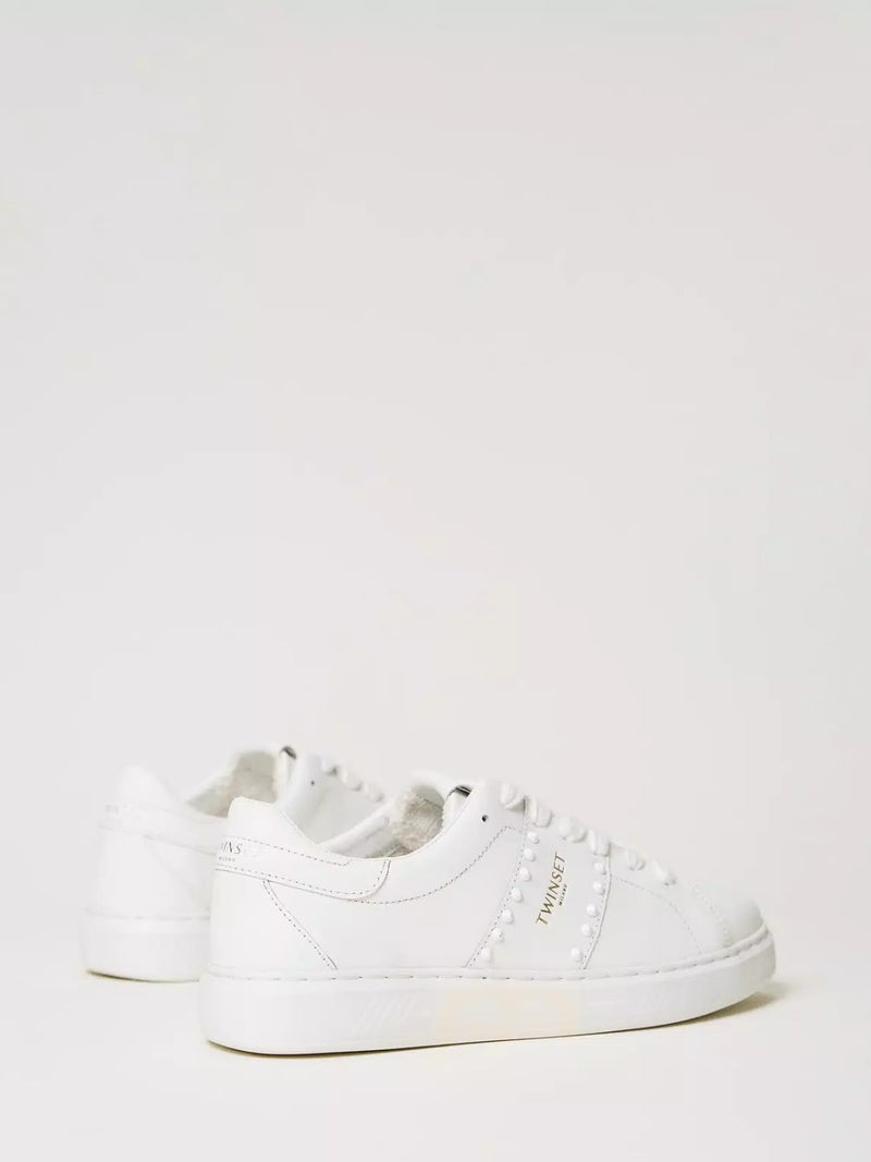 Sneakers in pelle con borchie Col. Bianco Ottico